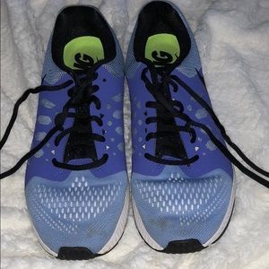 Purple Nike running shoes